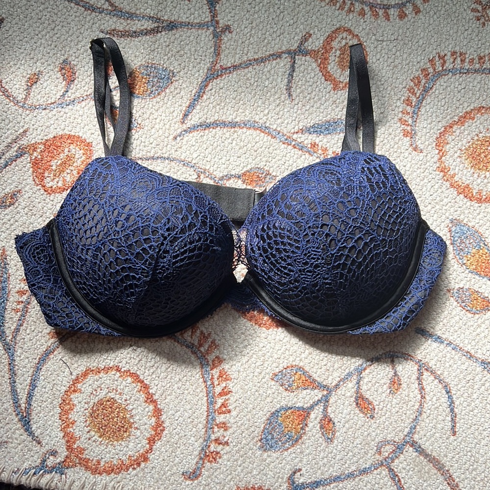 Blue and black lace bra